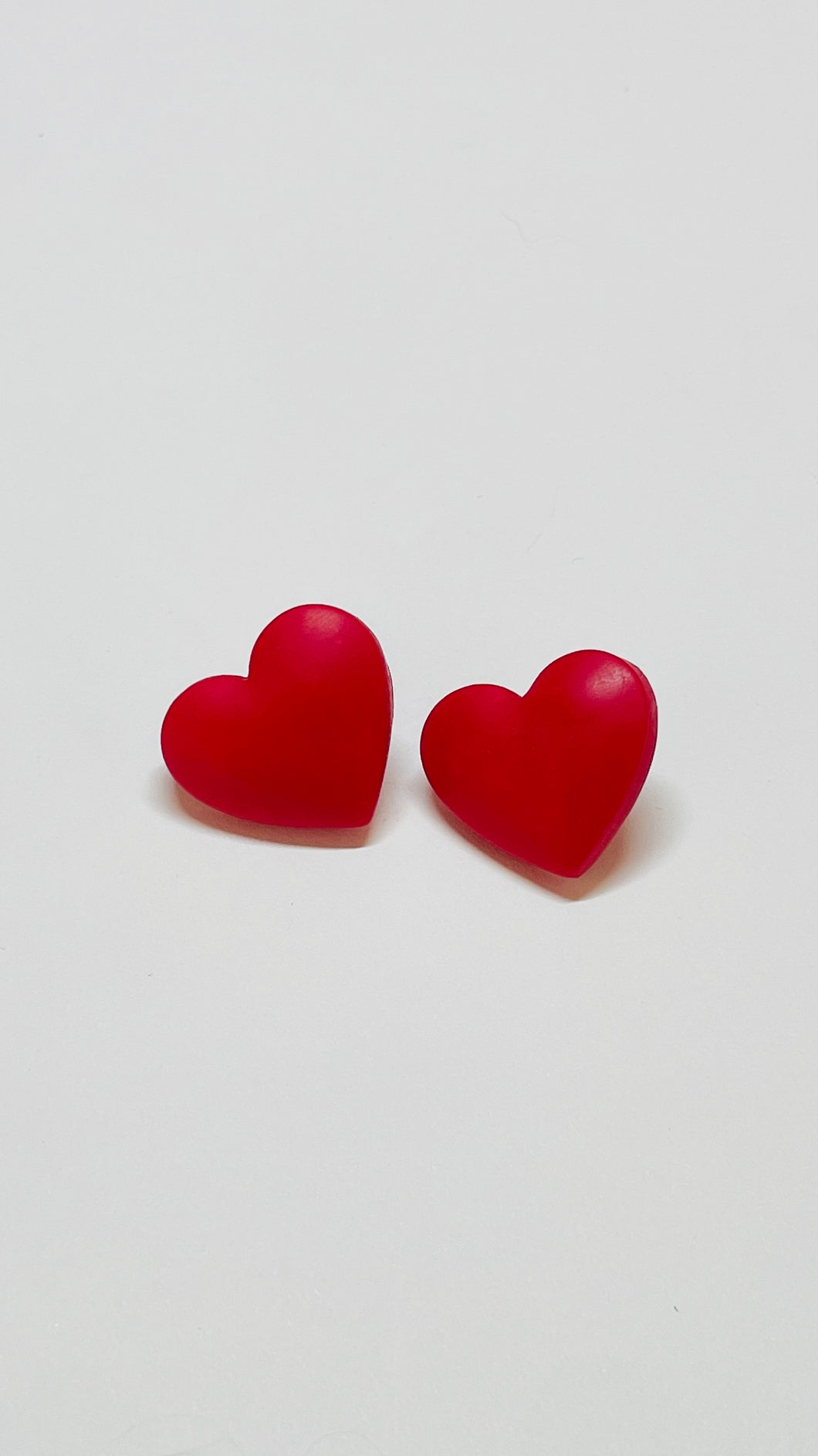 puffy heart studs (red)