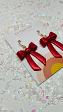 Load image into Gallery viewer, red glitter bow
