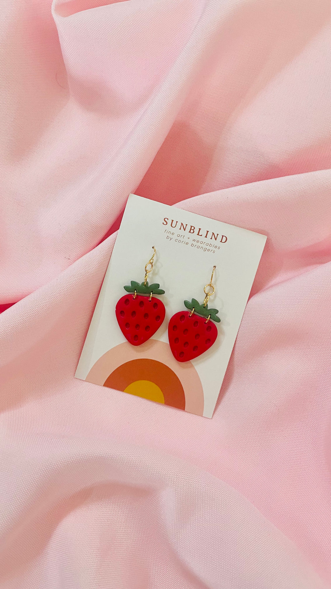 dangling strawberries